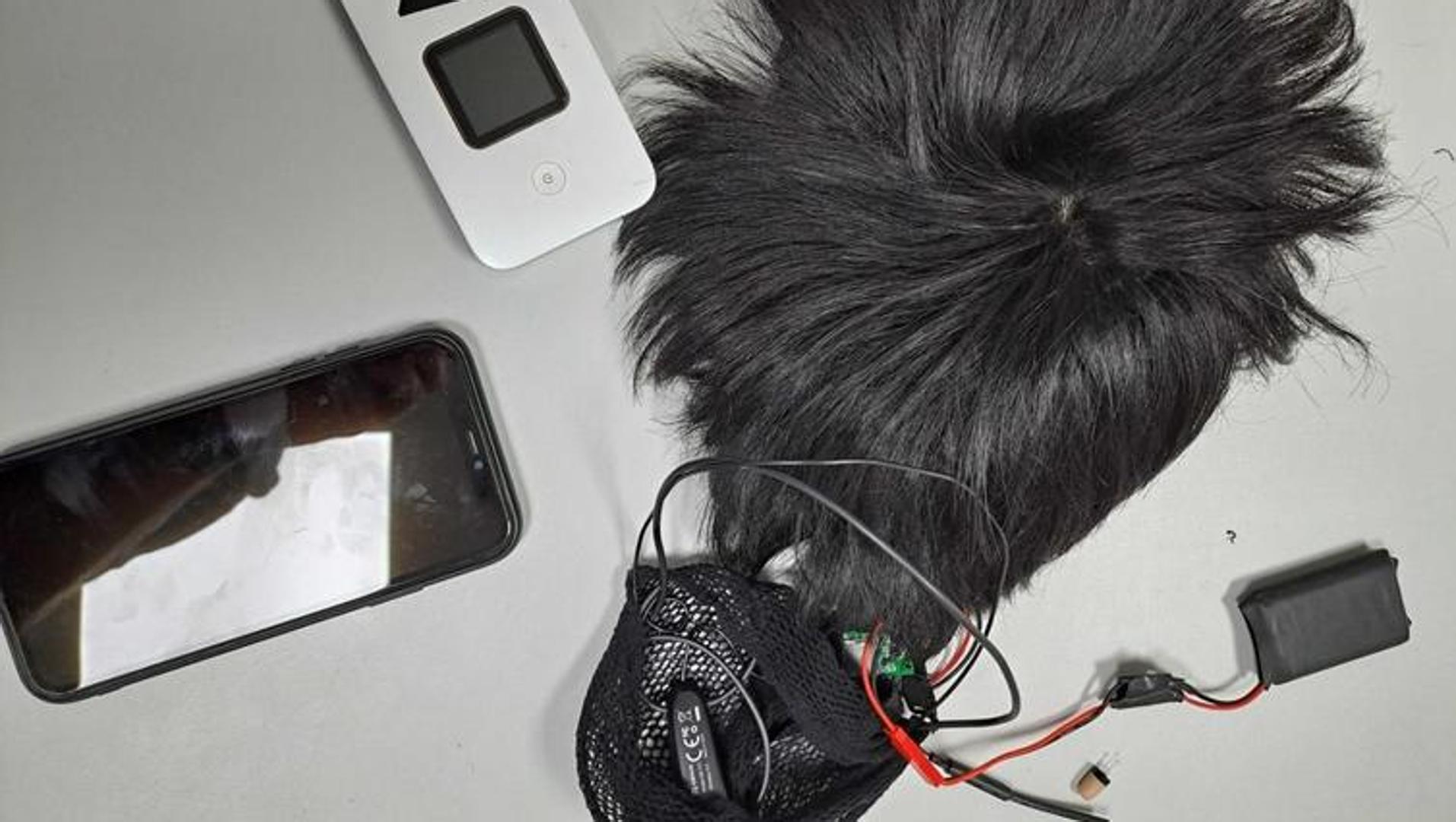 Man Caught Cheating On Spanish Driving Test With A Camera And Earpiece man-caught-cheating-on-spanish-driving-test-with-a-camera-and-earpiece